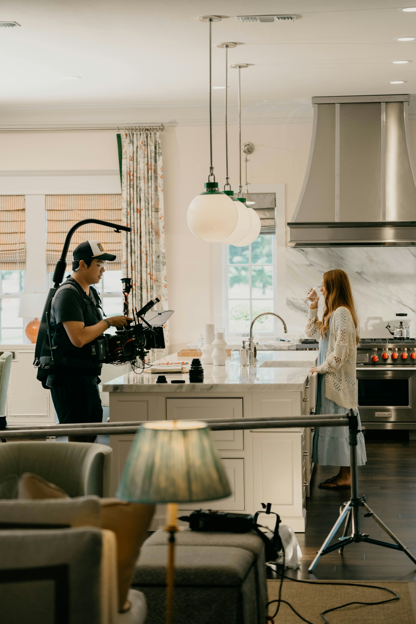 A camera crew filming in a kitchen